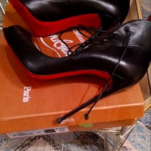 Christian Louboutin, size 41, or 11.